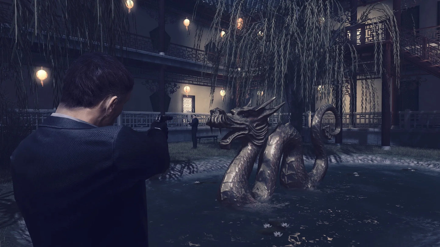 Person in a dark coat interacting with a dragon statue in a snowy, gothic setting.