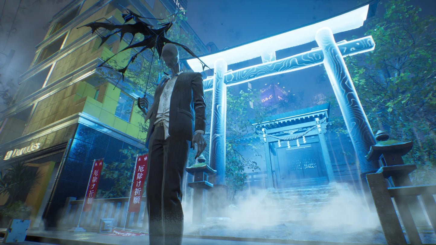 Man in a suit standing in front of a traditional Japanese torii gate with a blue tint.