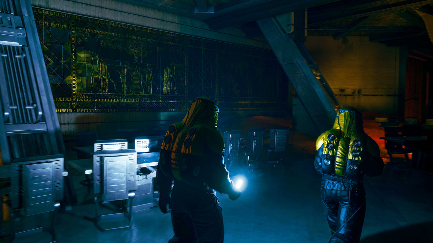Two people in futuristic suits in a dark, high-tech room with glowing screens.