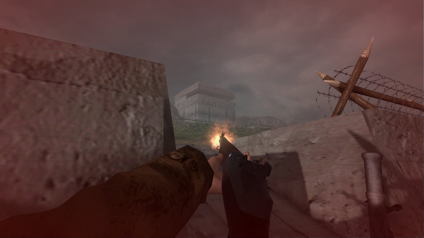 First-person shooter game scene with a gun aimed at a wall in a snowy landscape.