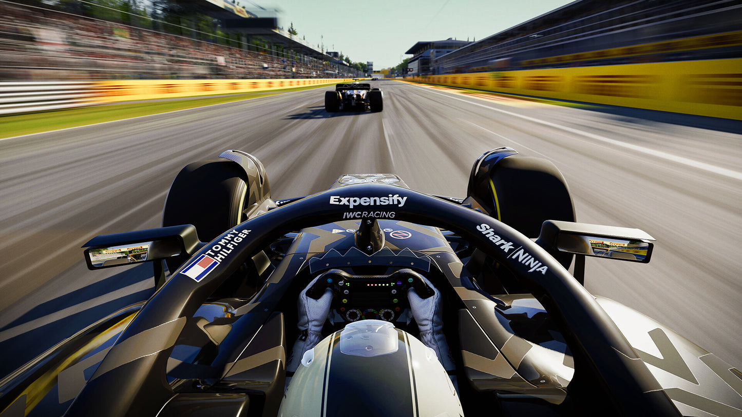 Racing car on a track with 'Expensify' branding