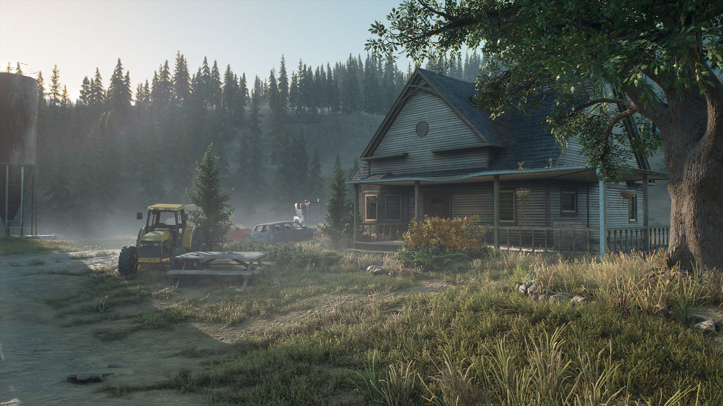 Wooden cabin in a forest with a tractor in the foreground