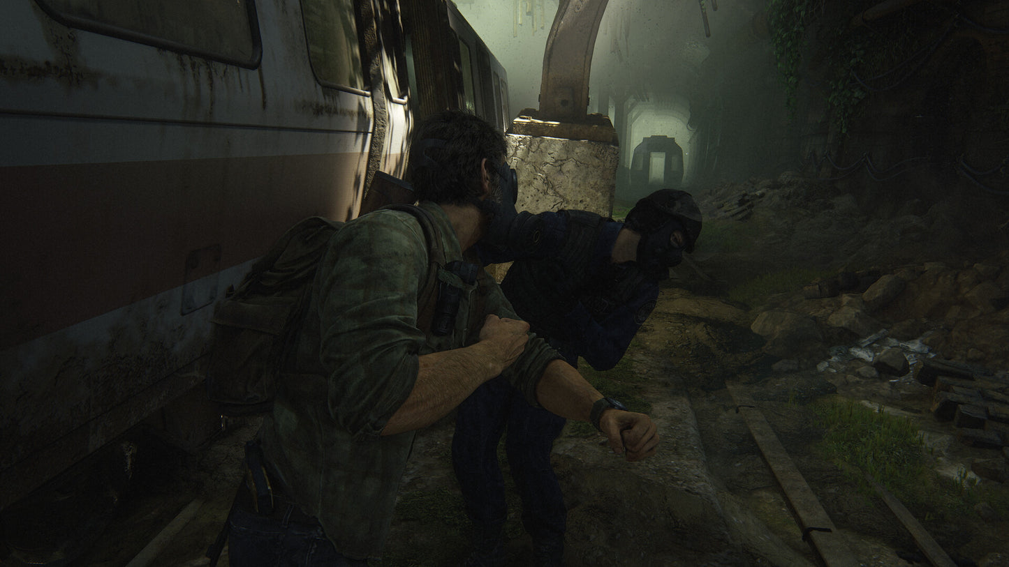 Two characters in a dark, foggy tunnel with an abandoned vehicle.