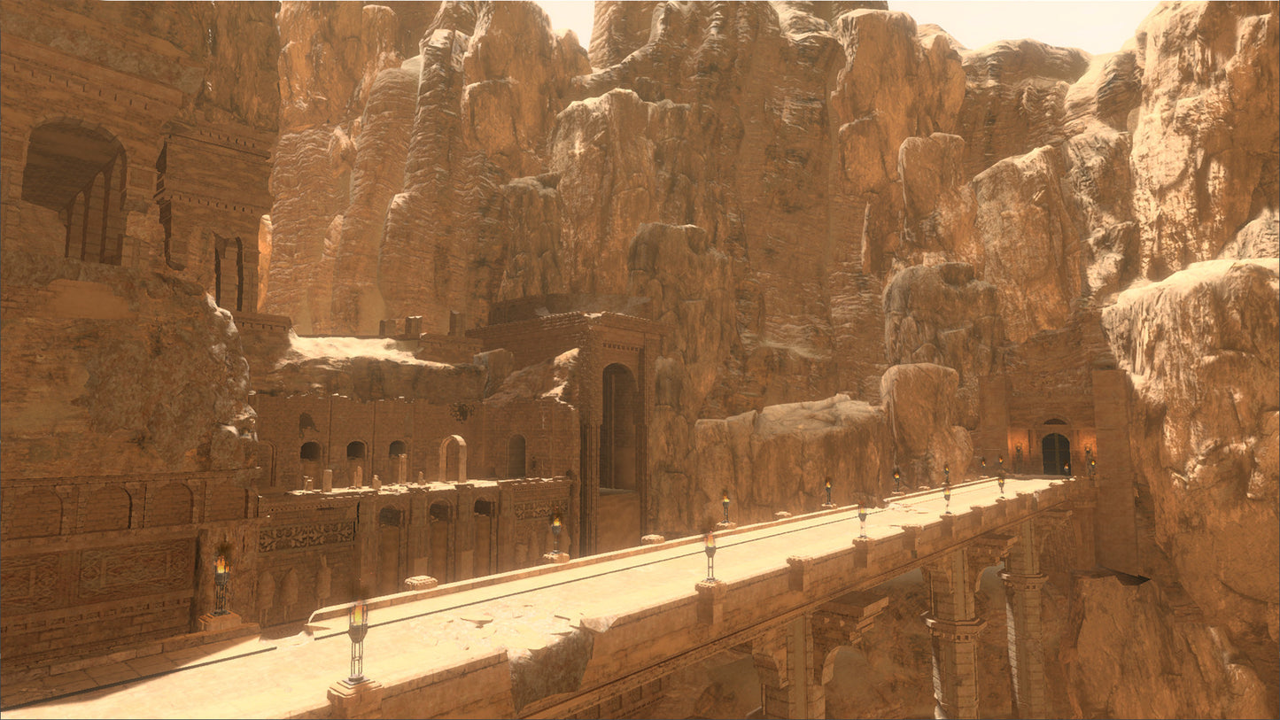 Rock-cut temple complex with statues in a desert landscape