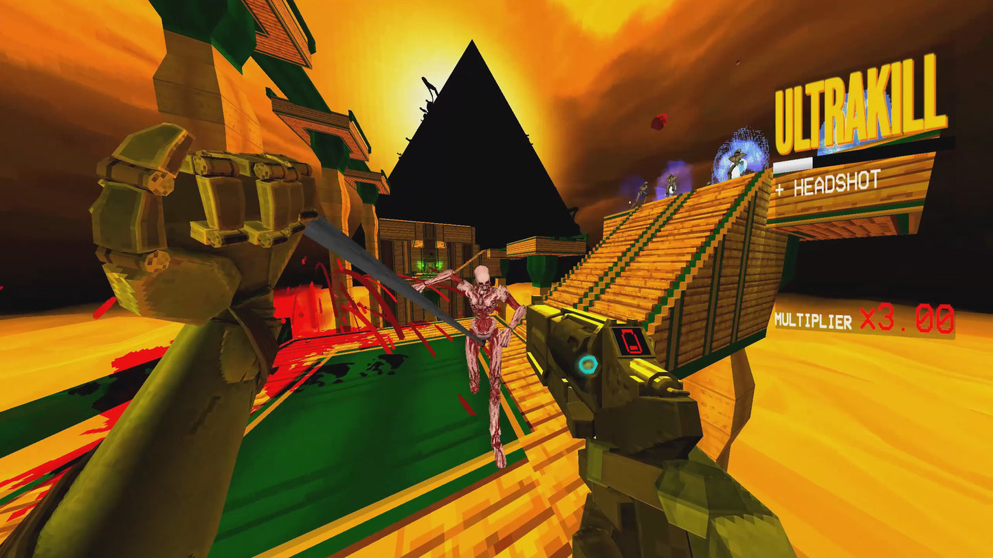 Screenshot of a first-person shooter game with a pyramid and desert landscape.