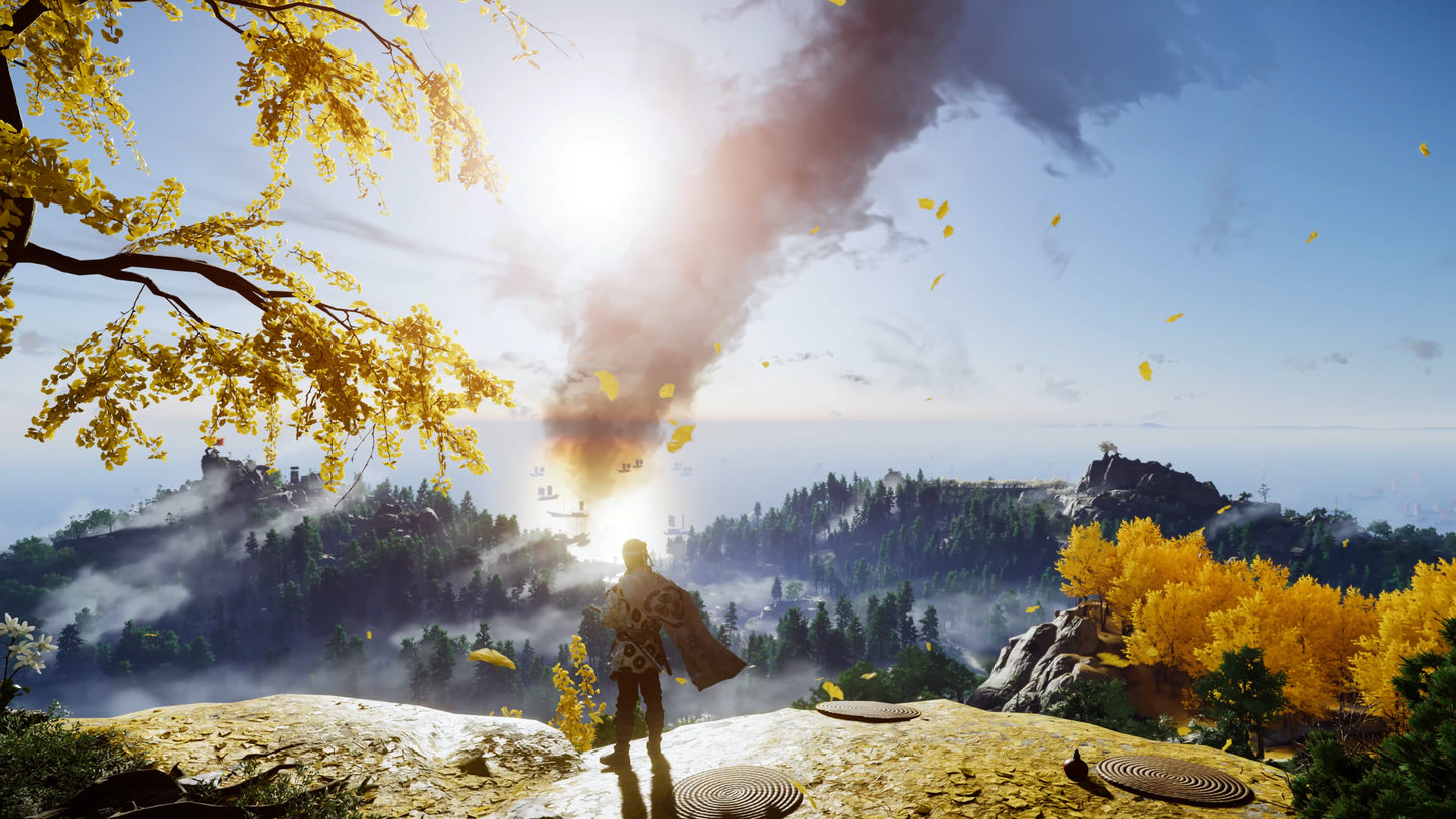Person standing on a rocky outcrop with a large smoke cloud and autumn foliage in the background
