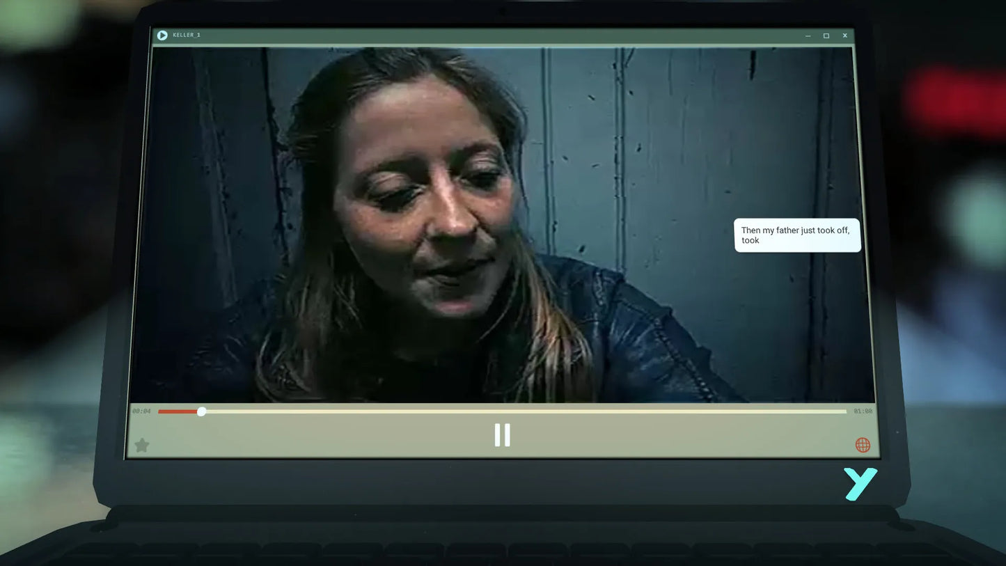 Laptop screen displaying a video call with a person, showing a paused video player interface.