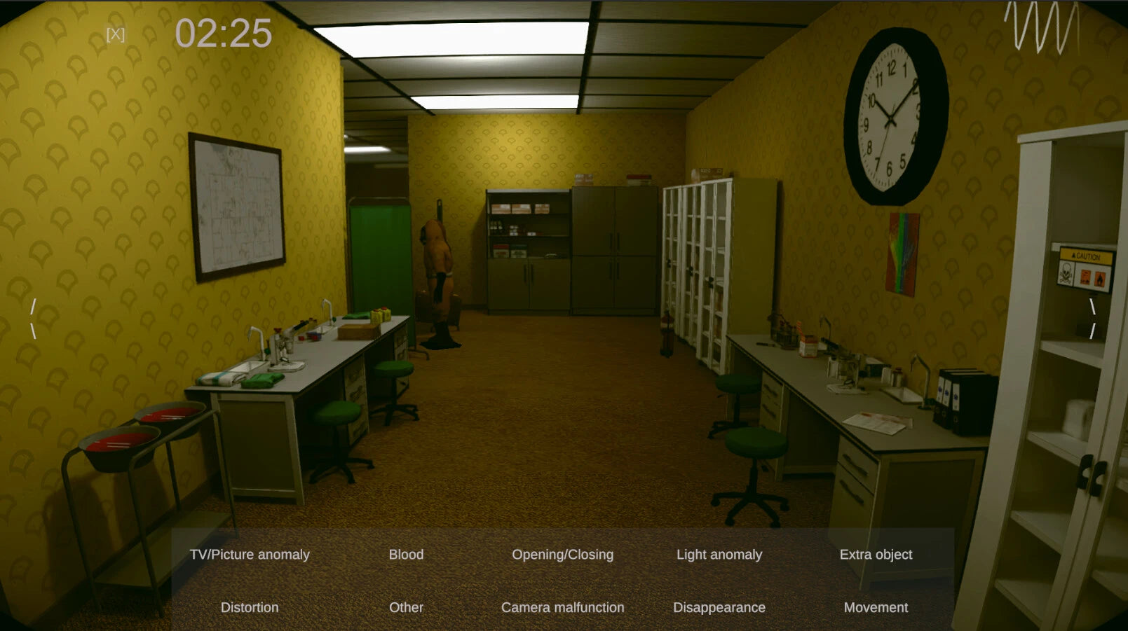 Yellow room with desks, chairs, and a clock on the wall.