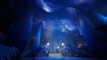 Mysterious underwater cave with large stalactites and a dimly lit path.