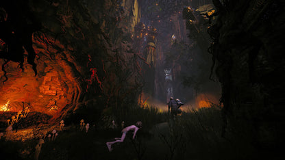 Dark cave scene with glowing elements and figures in the distance