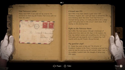 Open book with text and a letter held by white-gloved hands