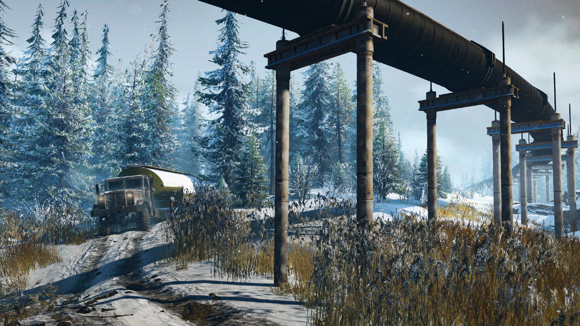 Vintage truck on a snowy road with a large pipeline structure in a forested area