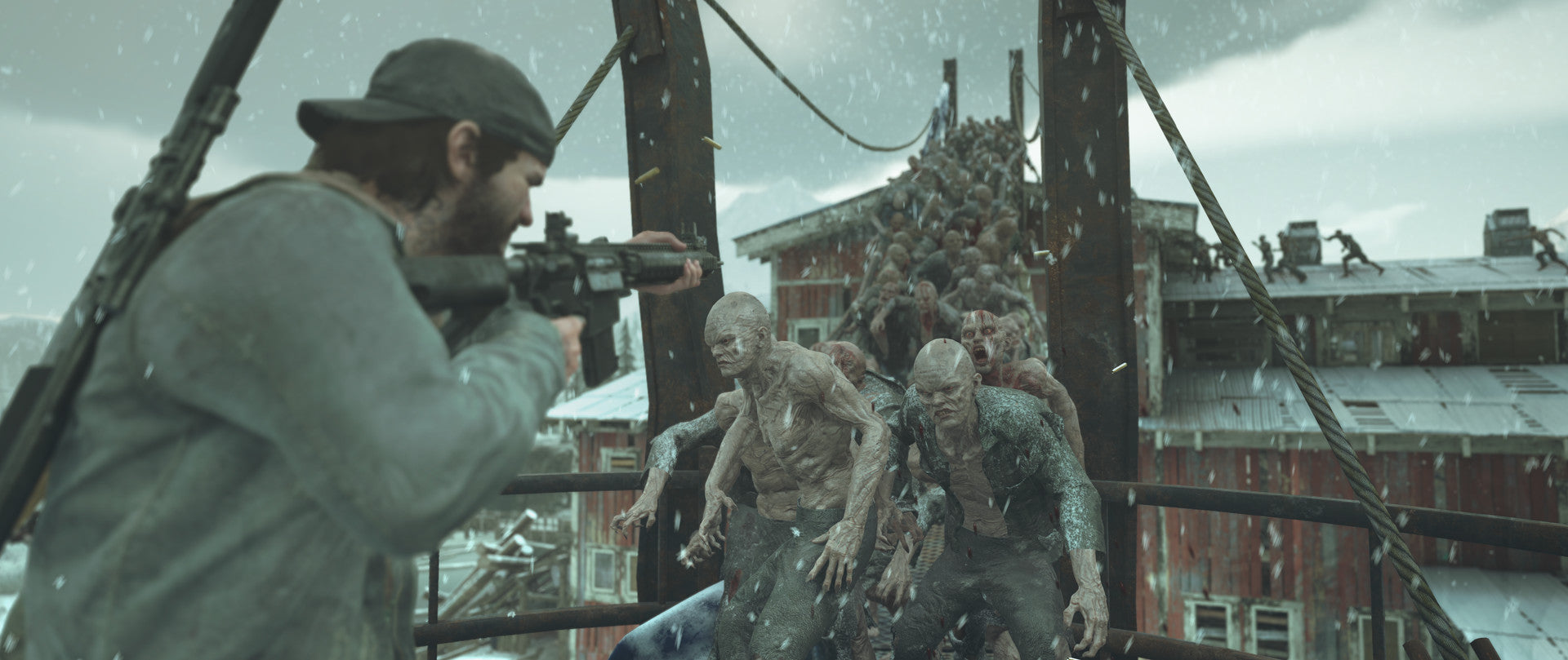 Person with a camera filming zombies on a bridge