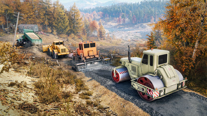Construction vehicles on a road with autumn trees in the background