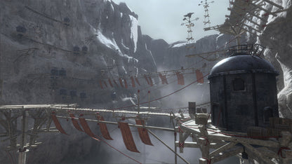Snowy mountain landscape with a futuristic structure and flags