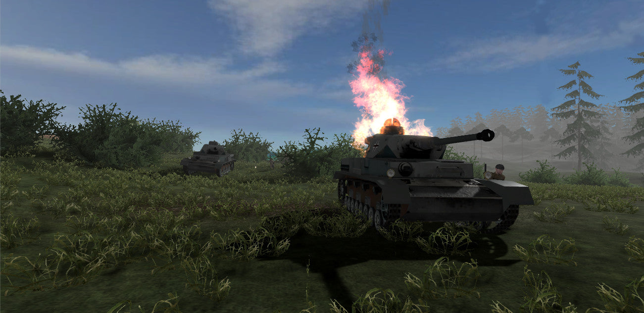 Tank firing in a grassy field with trees in the background