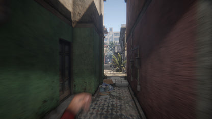 Narrow alleyway between buildings with a hand reaching out