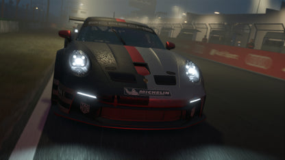 Racing car on a track with a dark, misty background
