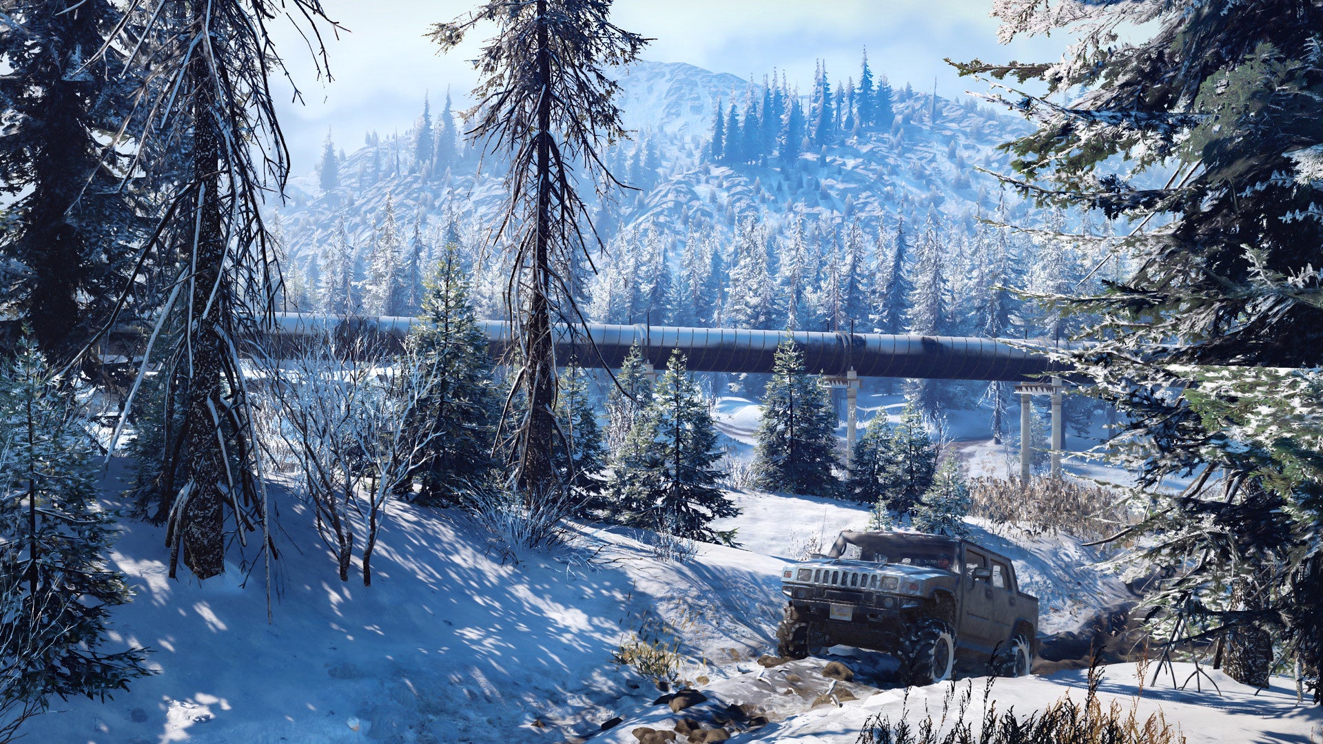 Jeep in a snowy forest with a mountain in the background