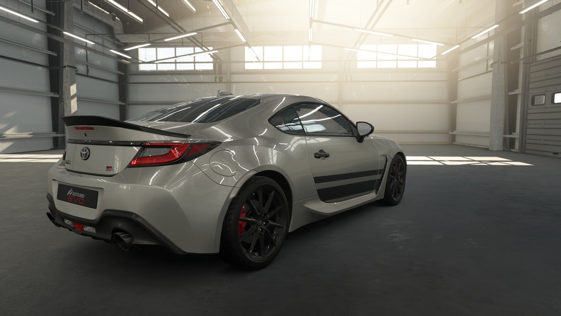 White sports car in a garage with sunlight streaming in