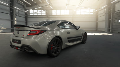 White sports car in a garage with sunlight streaming in
