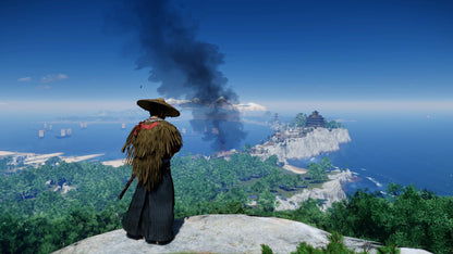 Person in traditional attire overlooking a scenic landscape with a large cloud of smoke in the distance.
