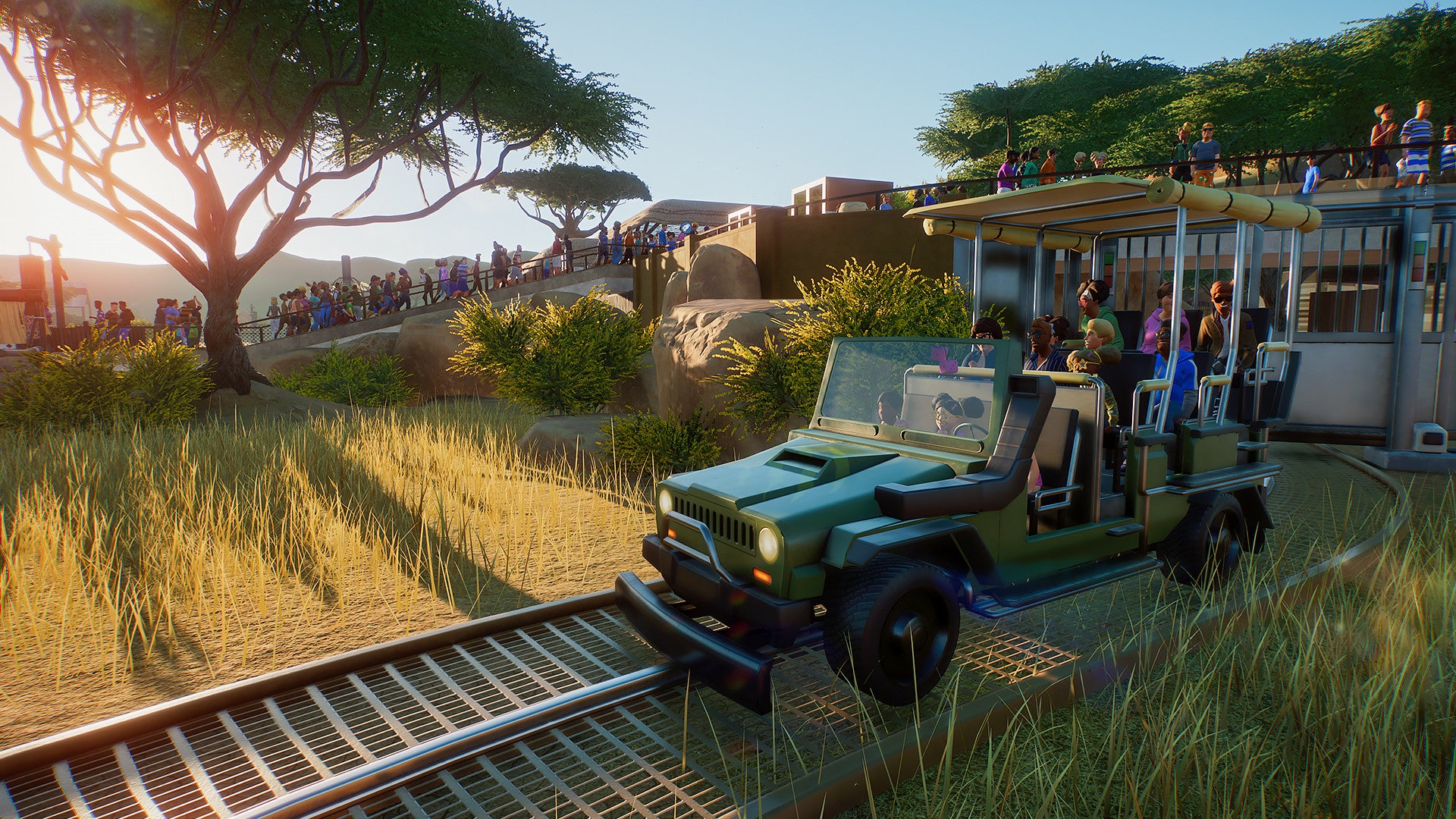 Safari vehicle with passengers on a grassy path in a scenic setting