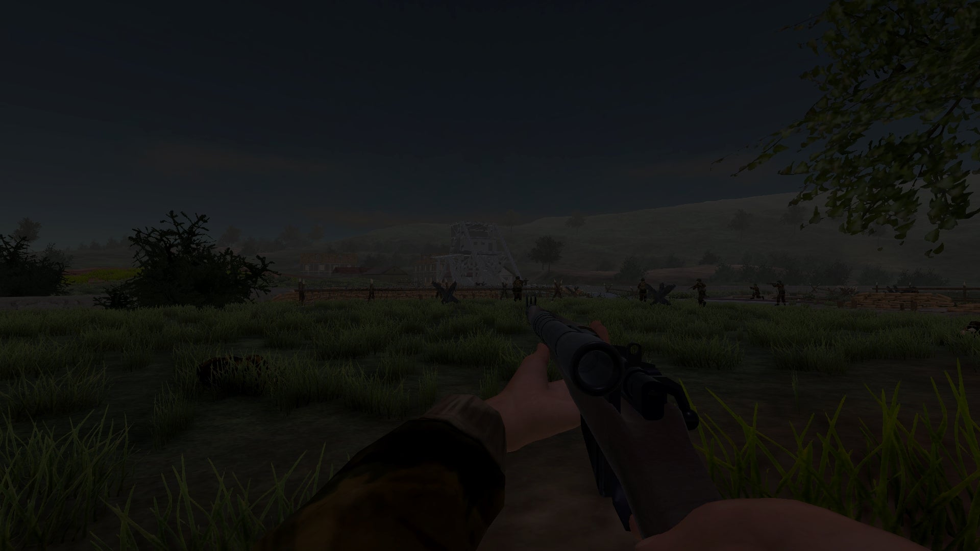 First-person view of a character holding a gun in a grassy field with trees in the background