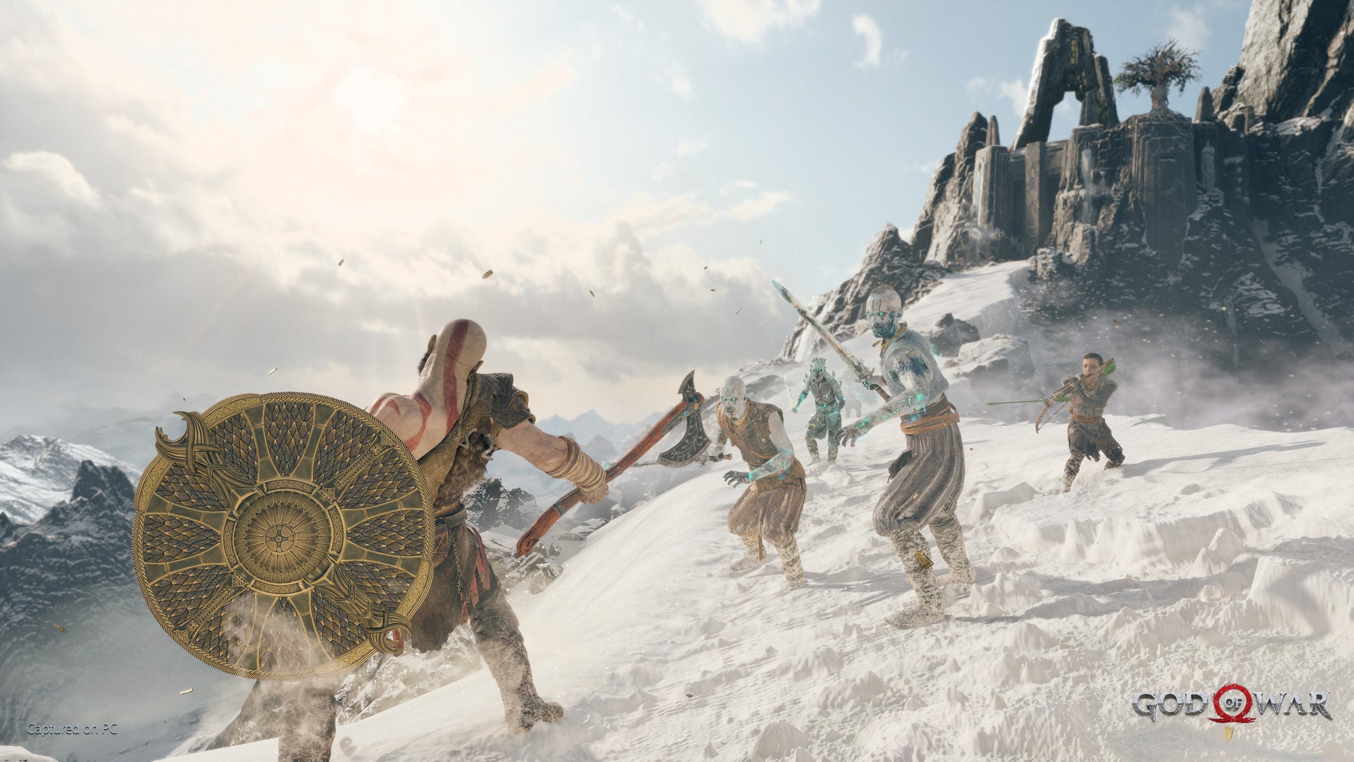 Game scene from 'God of War' with characters in a snowy landscape